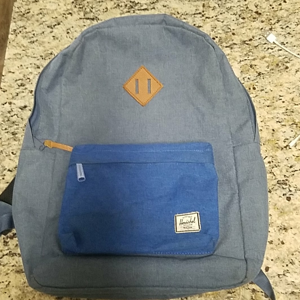 Blue Herschel backpack